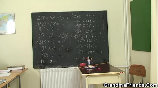 Very old blonde teacher two students